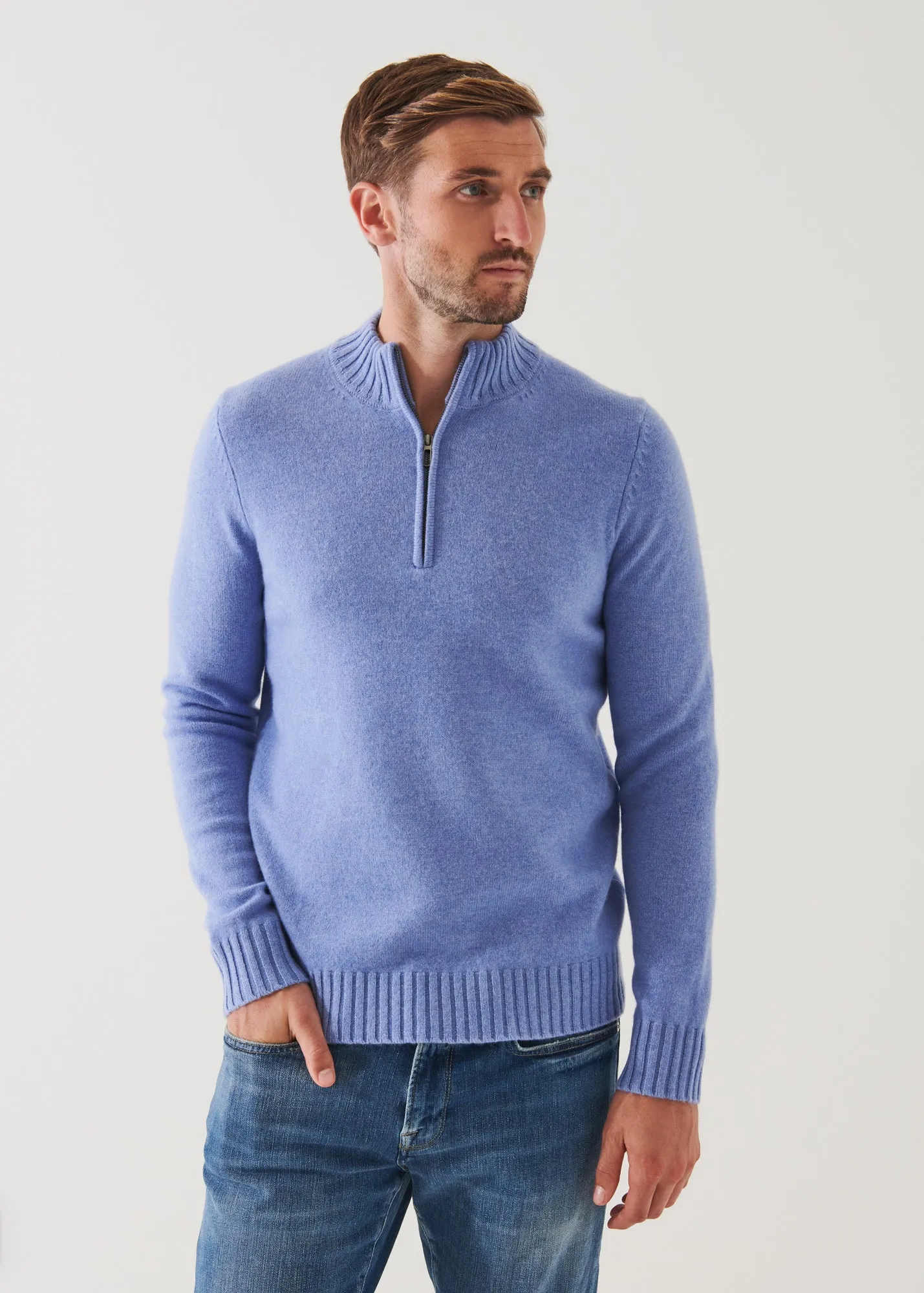 MERINO QUARTER ZIP SWEATER