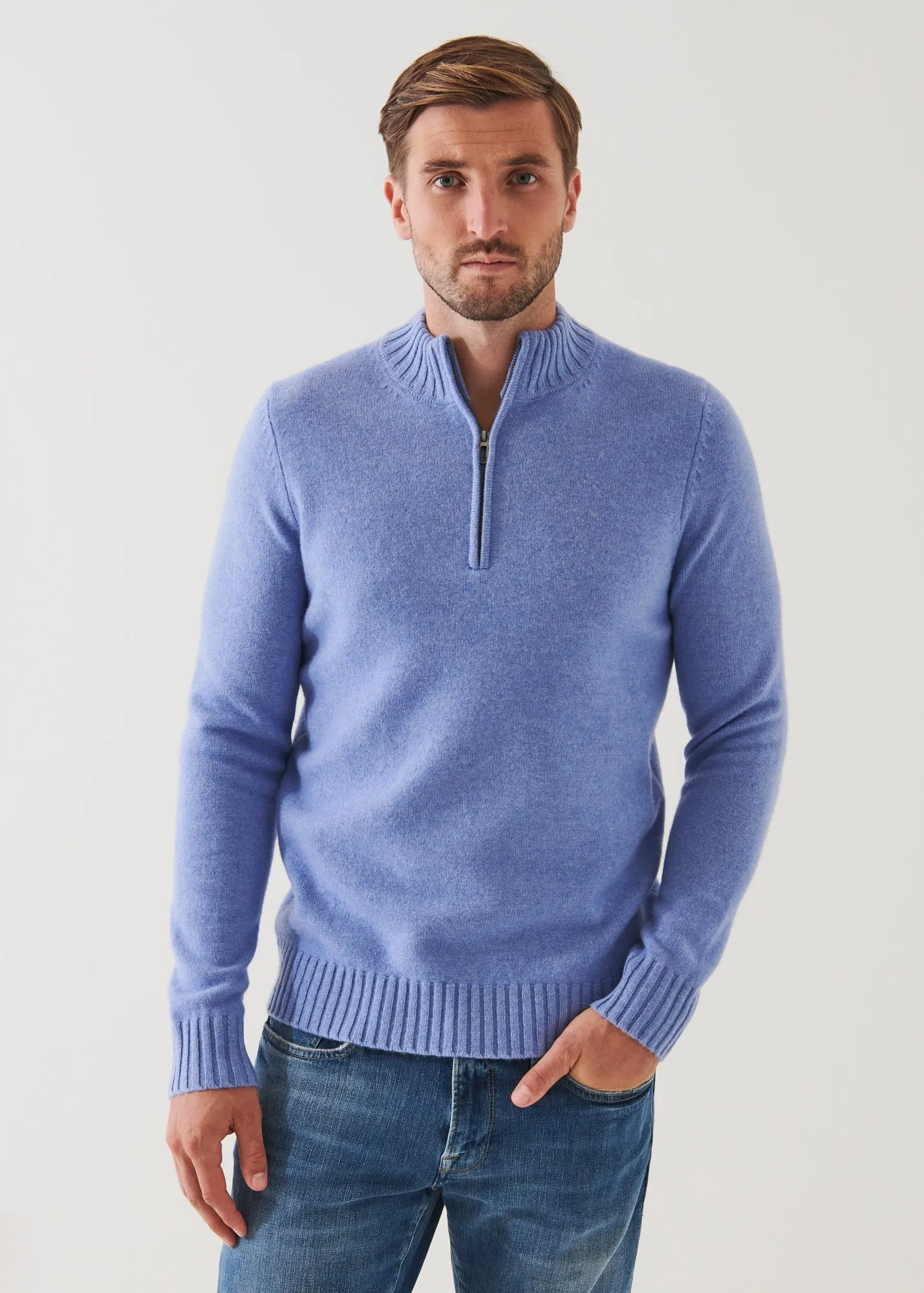 MERINO QUARTER ZIP SWEATER