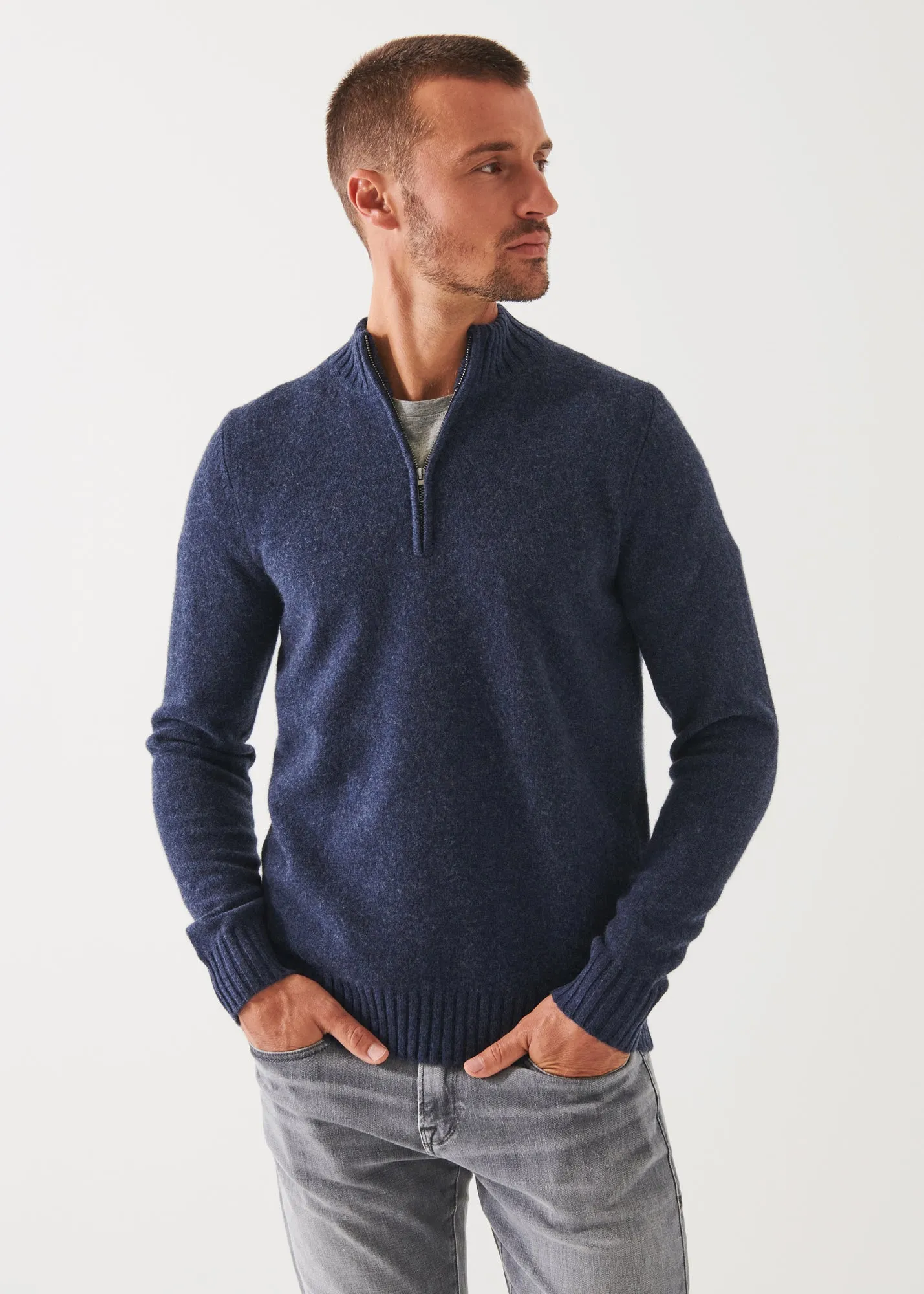 MERINO QUARTER ZIP SWEATER